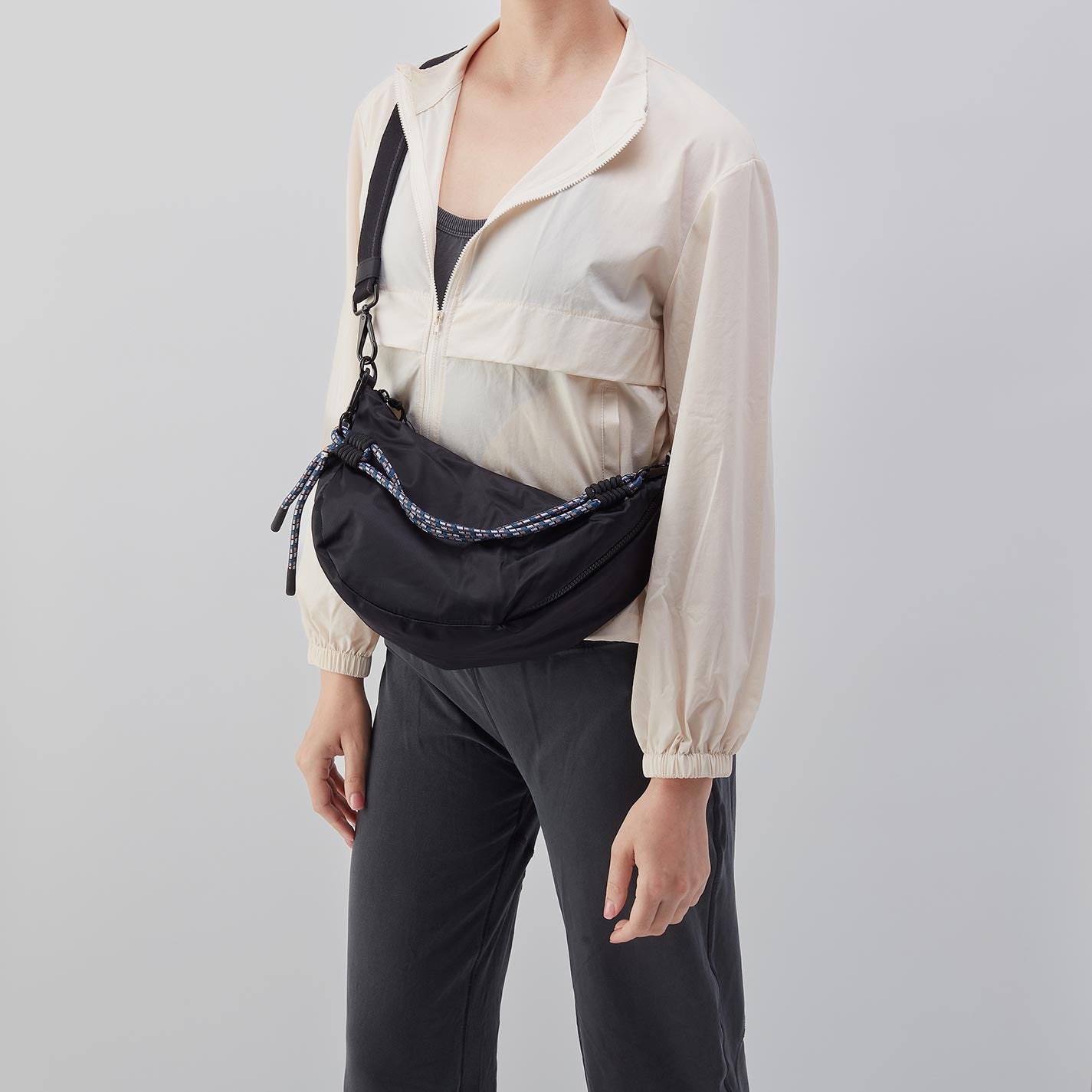 GO FOR IT Sling Crossbody in CaRefiber recycled nylon - Teal - Image 5