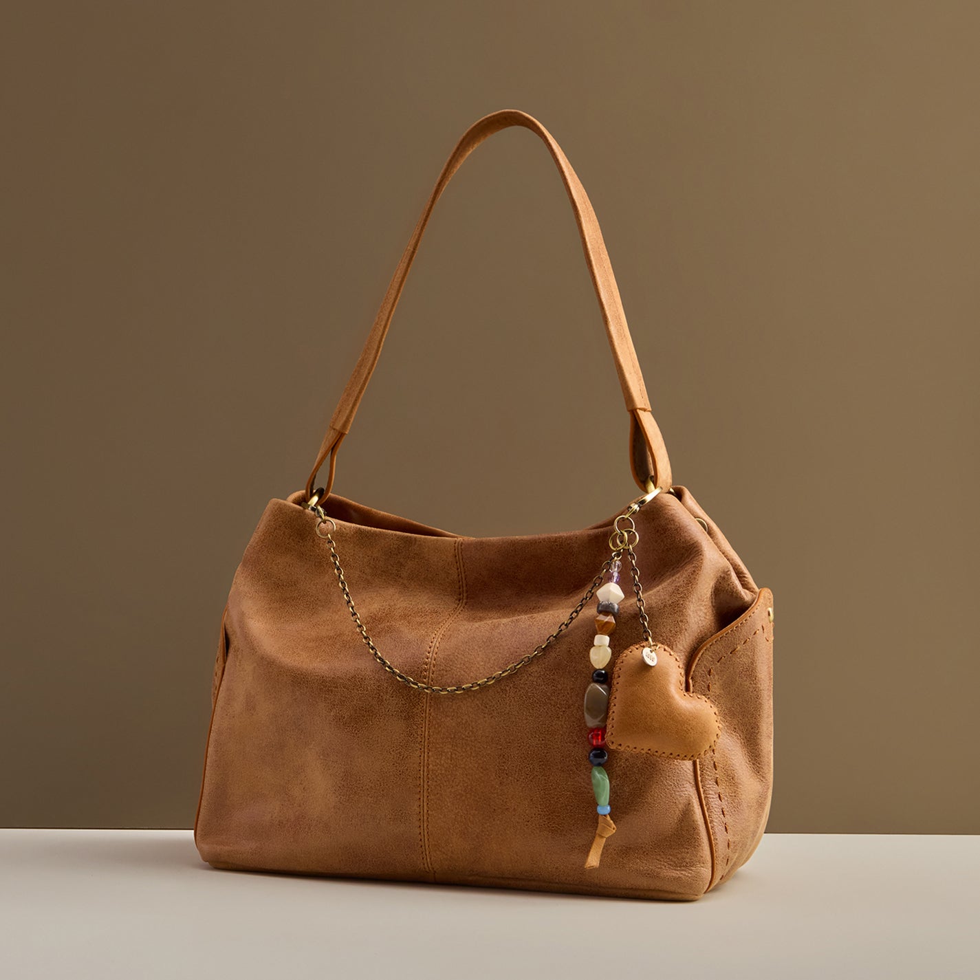 Heart Swells Charm in Buffed Leather - Whiskey - Image 2